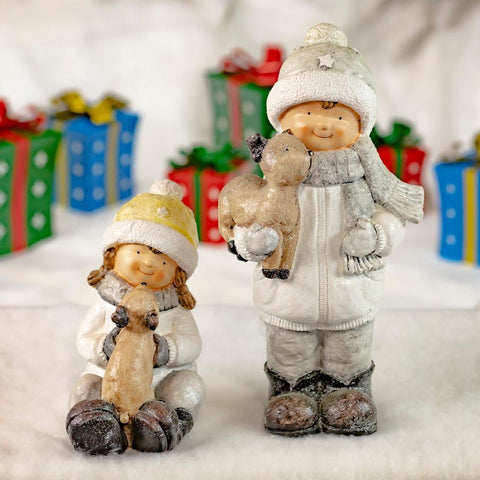 Set of 2 Tushka Snow Children in White Holding Baby Reindeer