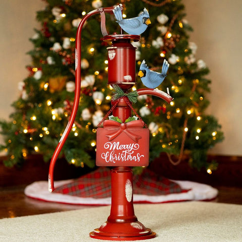 Old Style Red Iron Water Pump with "Merry Christmas" Sign and Birds